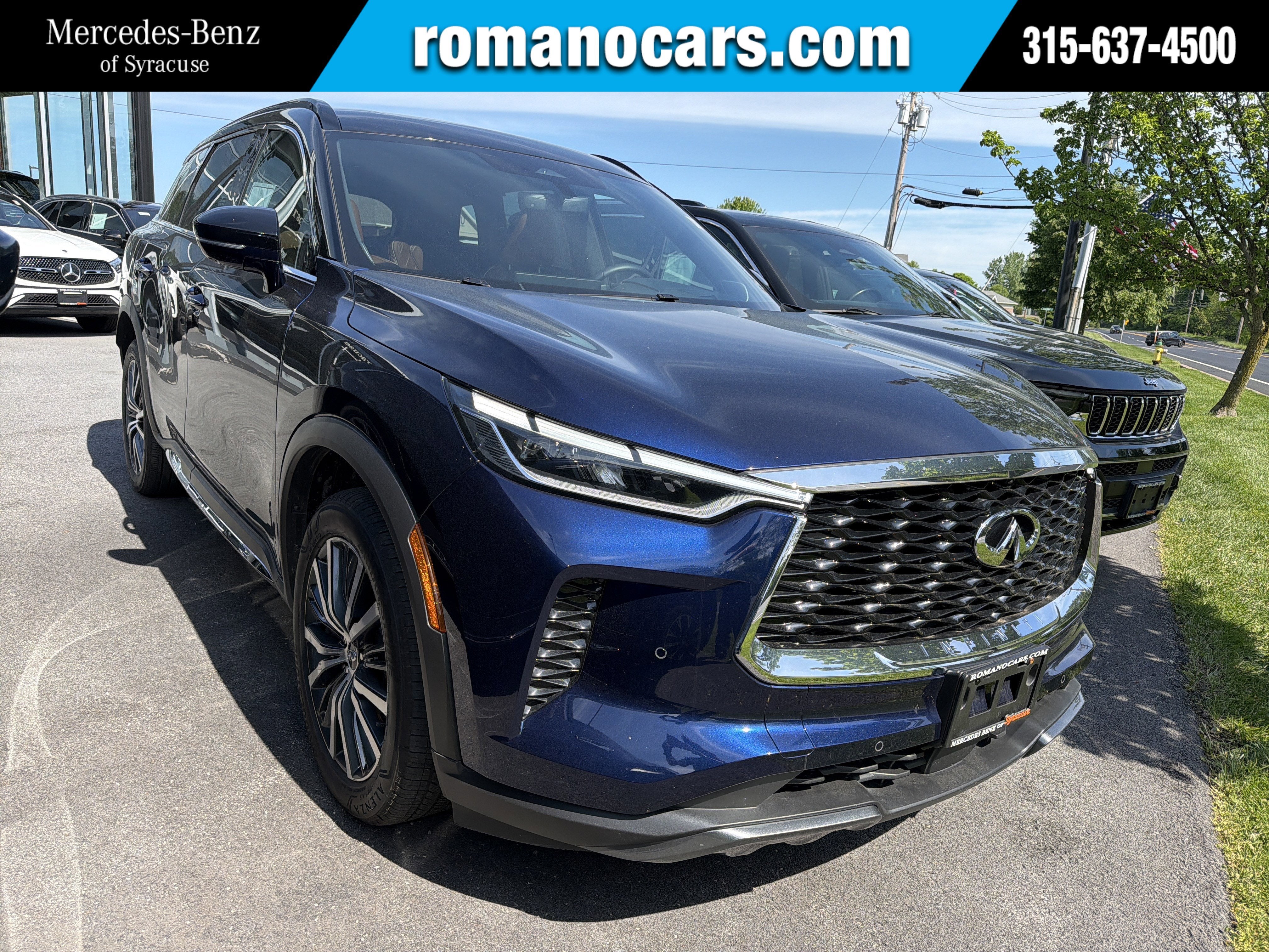 2024 INFINITI QX60 AUTOGRAPH AWD in Blue — front three-quarter view